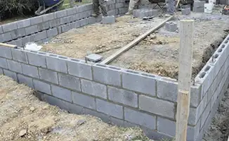 Professionals building a foundation with blocks in Hialeah, FL