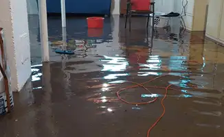 Basement with boiler, cabinets and washing machine completely flooded in Hialeah, FL